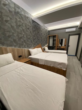 Standard Quadruple Room, Multiple Beds | Frette Italian sheets, premium bedding, blackout drapes, soundproofing