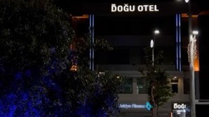 A building with a sign reading "DOĞU OTEL" at night, illuminated by street lights. - OTEL ORTADOĞU (Sanliurfa)