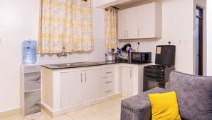 Apartemen Deluks, 1 kamar tidur | Area keluarga | Smart TV 42-inci dengan saluran TV digital dan Netflix