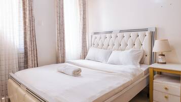 Deluxe Apartment, 1 Bedroom | 1 bedroom, down comforters, individually decorated, iron/ironing board