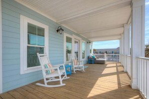 Terrace/patio - Discover beachfront bliss at Starboard Side, Oak Island's spacious 4-bedroom retreat. (Oak Island)