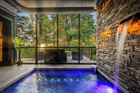 Indoor pool, a heated pool - Amazing spa getaway cabin with indoor pool, sauna, fire pit, luxe spa suite (Gatlinburg)