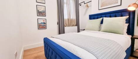 2 dormitorios, tabla de planchar con plancha, wifi y ropa de cama