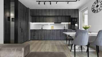 Comfort Apartment | Private kitchen | Mini-fridge, oven, stovetop, dishwasher