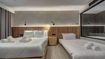 Deluxe Triple Room (Spa Bath in Bathroom) | 1 bedroom, in-room safe, desk, laptop workspace