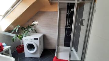 Shower, hair dryer, towels, soap