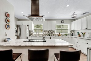 Fridge, microwave, oven, stovetop - Stunning 3B/2B Bungalow with Spacious, Outdoor Oasis!” in delightful Clearwater (Clearwater)