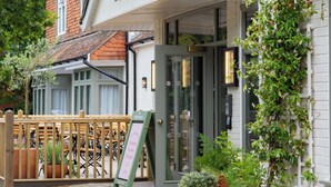 A traditional pub with a sign reading "The Rope Maker" and a wooden fence surrounding the seating area. -  The Ropemaker - A Heartwood Inn (Emsworth)
