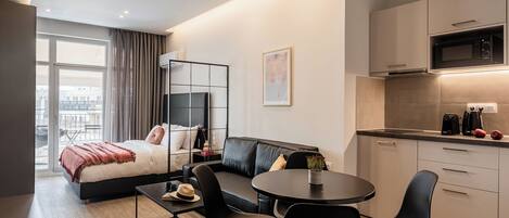 Design Apartment, Balcony, Partial Sea View | 1 bedroom, pillowtop beds, individually decorated