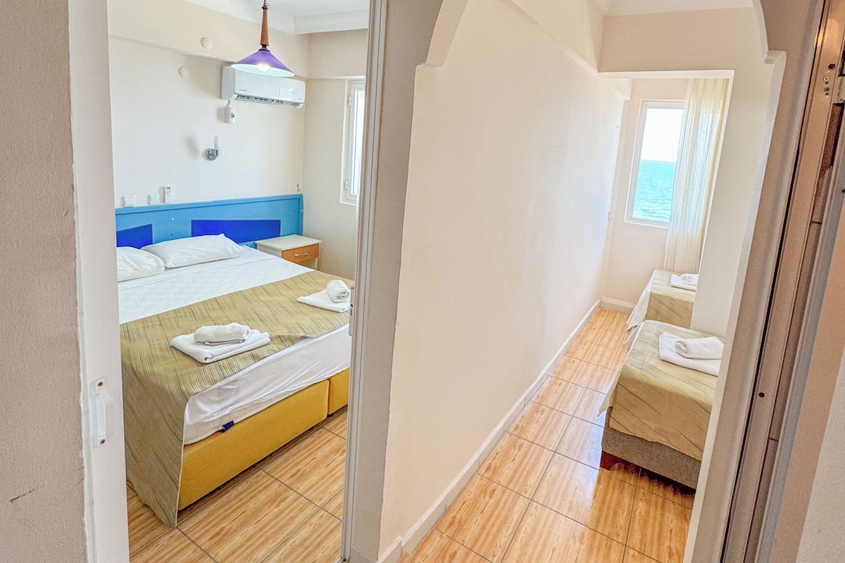 Comfort Quadruple Room, Sea View | WiFi (free), bed sheets