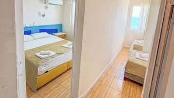 Comfort Quadruple Room, Sea View | Free WiFi, bed sheets