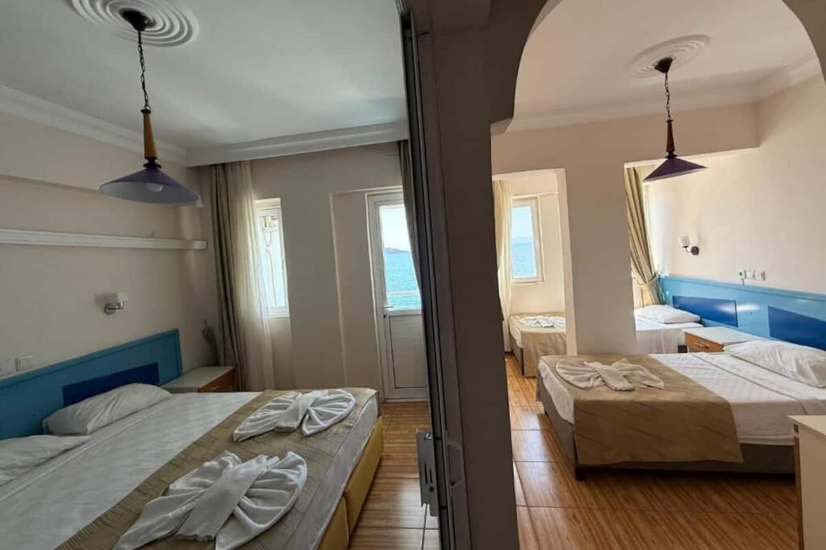 Comfort Quadruple Room, Sea View | Free WiFi, bed sheets