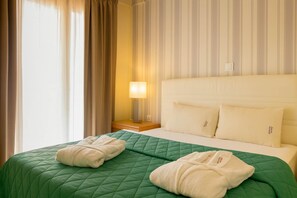 2 slaapkamers, een strijkplank/strijkijzer, reisbedje, wifi