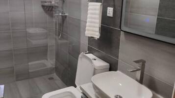 Shower, towels, soap, shampoo