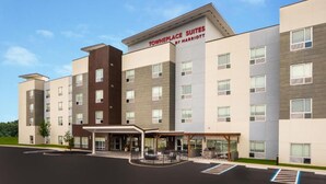 A modern hotel with a sign reading "Towneplace Suites by Marriott" featuring a multi-story structure, a covered entrance, and a parking area. - Towneplace Suites Pensacola West I-10 (Pensacola)