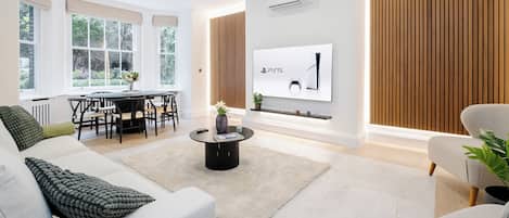 Luxury Apartment, 2 Bedrooms, Air conditioning | Living room | 75-inch Smart TV with digital channels