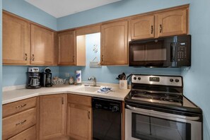 コンドミニアム クイーンベッド 1 台ソファーベッド付き (Villas on the Gulf unit G7) | 専用キッチン | オーブン、トースター、ペーパータオル