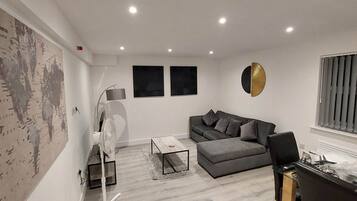 Basic Apartment | Living area | 42-inch Smart TV with digital channels