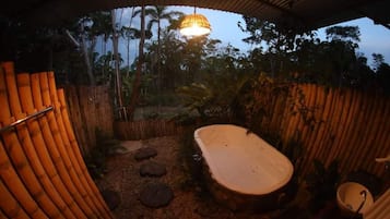 Luxury Cabin, 1 Bedroom, Patio, Resort View | Bathroom | Separate tub and shower, jetted tub, rainfall showerhead