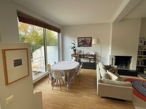 TV, fireplace, table football, books