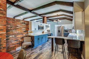 Fridge, microwave, oven, stovetop - Chic Family-Friendly Home in Riverside: 7 Mi to KC (Riverside)