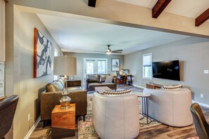 TV, fireplace, computer monitors - Chic Family-Friendly Home in Riverside: 7 Mi to KC (Riverside)