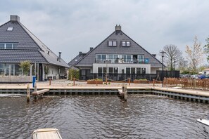 Enjoy waterfront views and scenic boat access from this modern property.