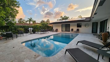 Outdoor pool, sun loungers