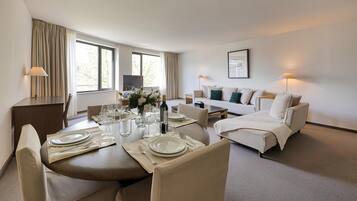 Luxury Penthouse, 1 King Bed, Private Bathroom | Living area | Flat-screen TV