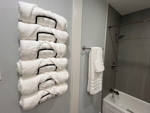 Shower, hair dryer, towels, soap - Quiet Condo_King Bed_Pool Views (Dallas)