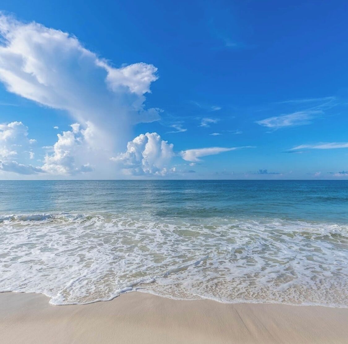 On the beach, sun-loungers