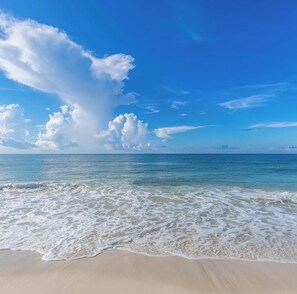 A beach with clear skies and waves. - Beachfront • Storm-Free & Guest Ready •  In Heart of OB • Sleeps 10 •... (Orange Beach)