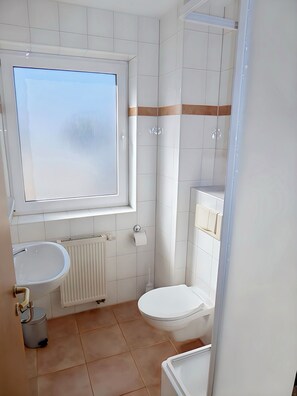 Hair dryer, towels, soap, toilet paper