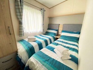3 slaapkamers, een strijkplank/strijkijzer, wifi, beddengoed