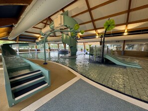 Enjoy thrilling water slides and a pool area at this indoor water park.