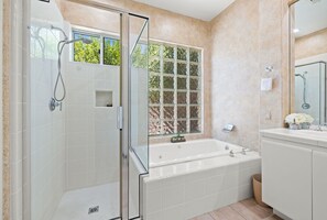 Shower, hair dryer, towels, soap