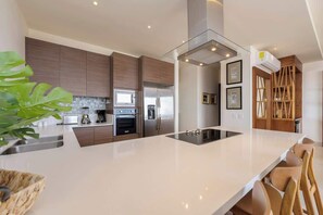 Fridge, microwave, oven, stovetop - Vista Vela II 2307 Spectacular New 2BR Condo with BBQ and Ocean views (Cabo San Lucas)