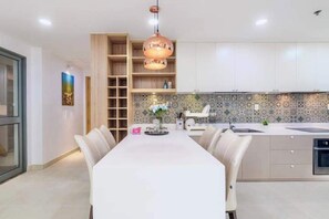 Fridge, cookware/dishes/utensils - AmbiHOME Airy park view 2Br @ Masteri Thao Dien T4 (Ho Chi Minh City)