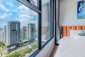 2 habitaciones, tabla de planchar con plancha, cuna de viaje y wifi