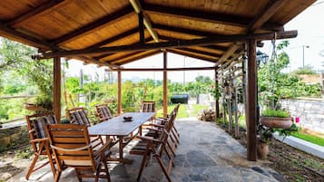 Comfort villa, uitzicht op tuin | Terras