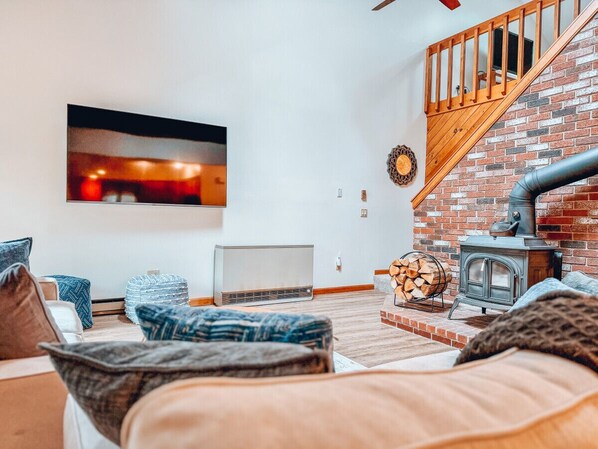 Smart TV, fireplace, foosball, books
