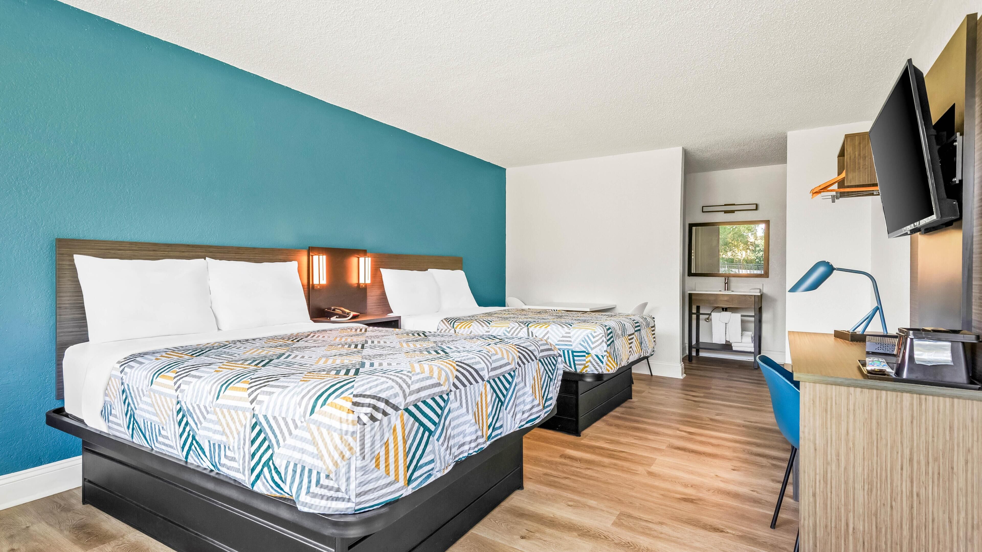 Deluxe Room, 2 Double Beds, Non Smoking, Refrigerator & Microwave | Free WiFi, bed sheets