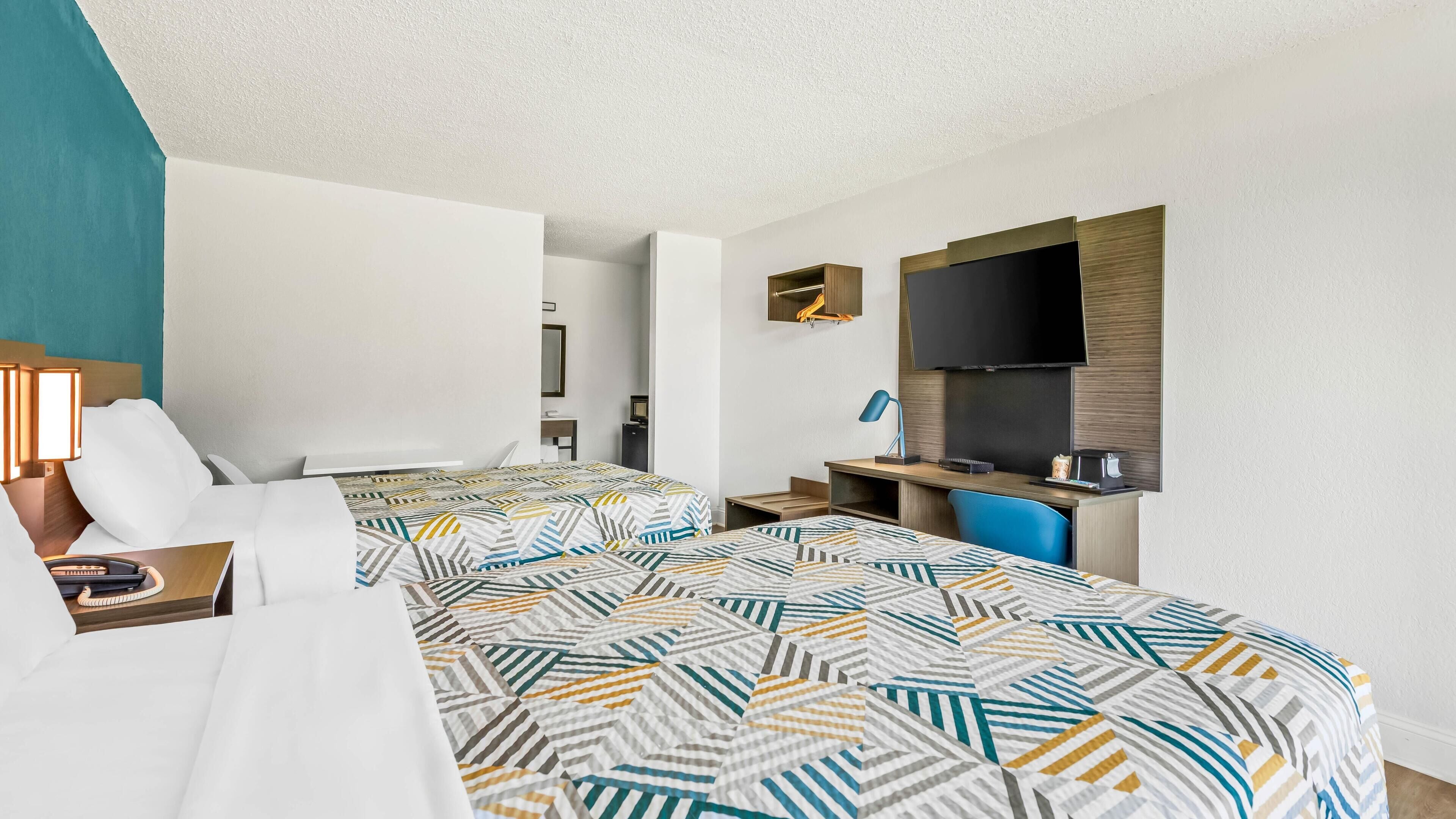 Deluxe Room, 2 Double Beds, Non Smoking, Refrigerator & Microwave | Free WiFi, bed sheets