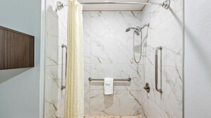 Chambre Deluxe, 1 très grand lit, non-fumeur | Salle de bain accessible aux personnes à mobilité réduite