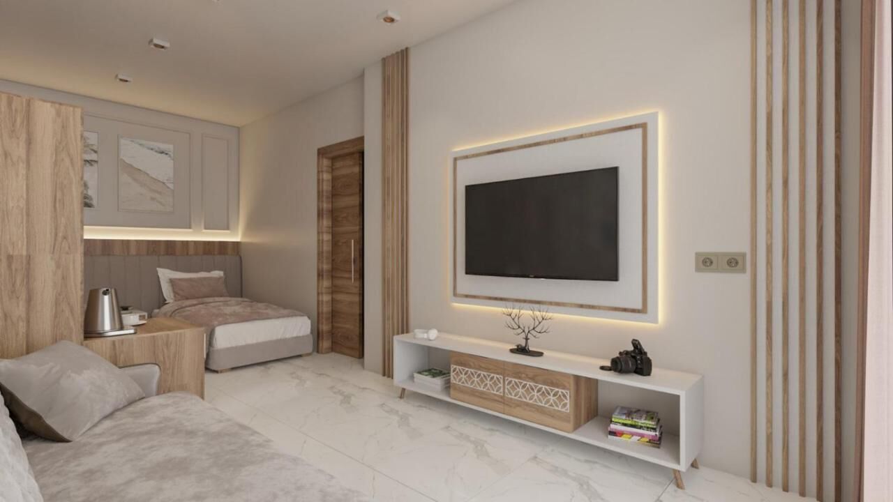 Seprai premium, minibar, brankas, dan meja kerja
