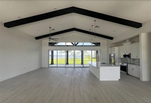 Lake Front NEW house on 1 acre in gated community.  3/2.5/2.5 on Lake Francis.