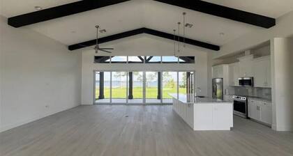 Lake Front NEW house on 1 acre in gated community. 3/2.5/2.5 on Lake Francis.