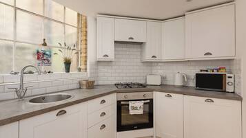 Fridge, oven, electric kettle, toaster