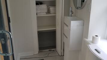 Hair dryer, towels, soap, shampoo