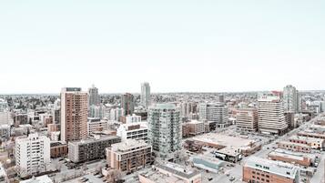 A cityscape with various buildings, including high-rise apartments and commercial structures.